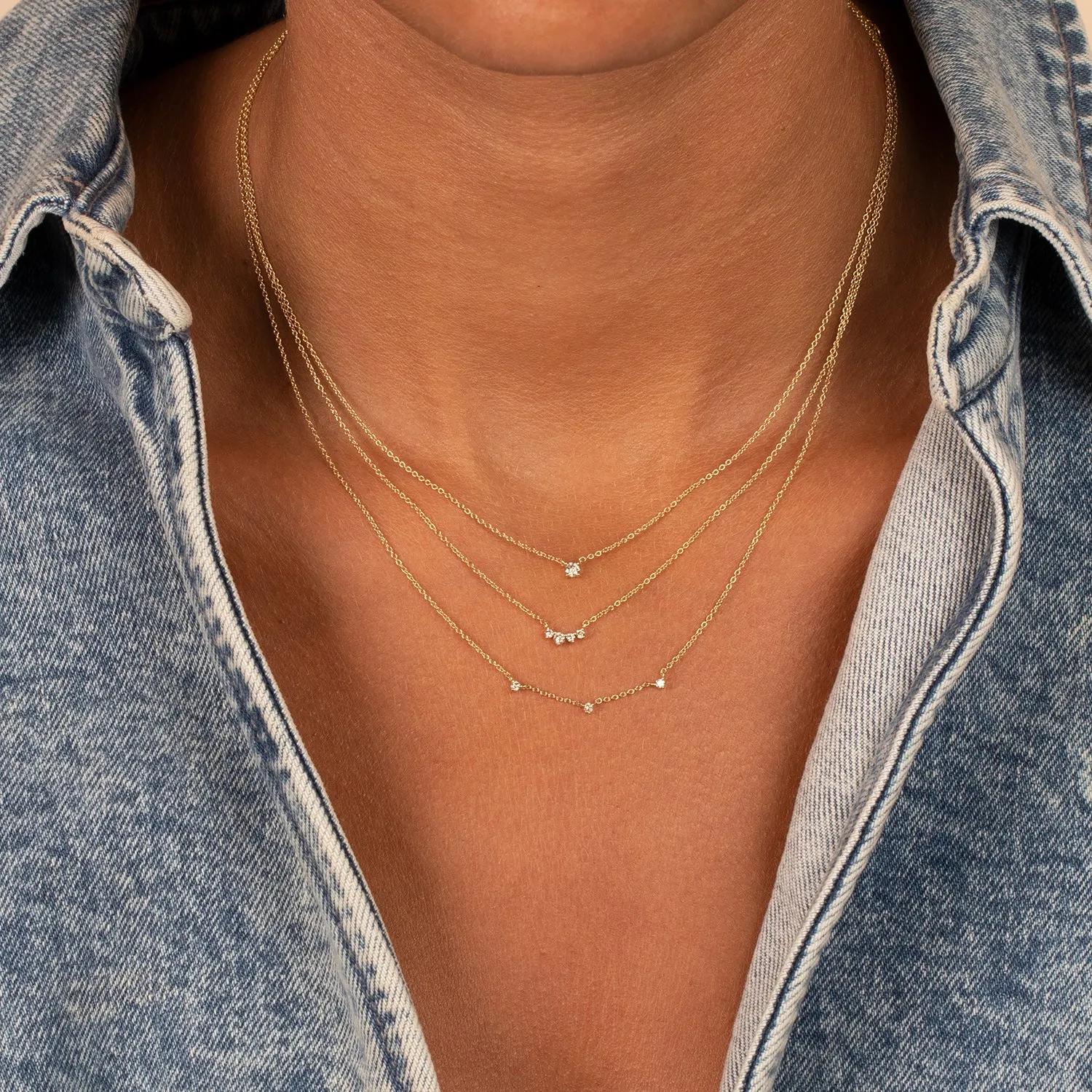 Diamond Graduated Solitaire Curved Bar Necklace 14K