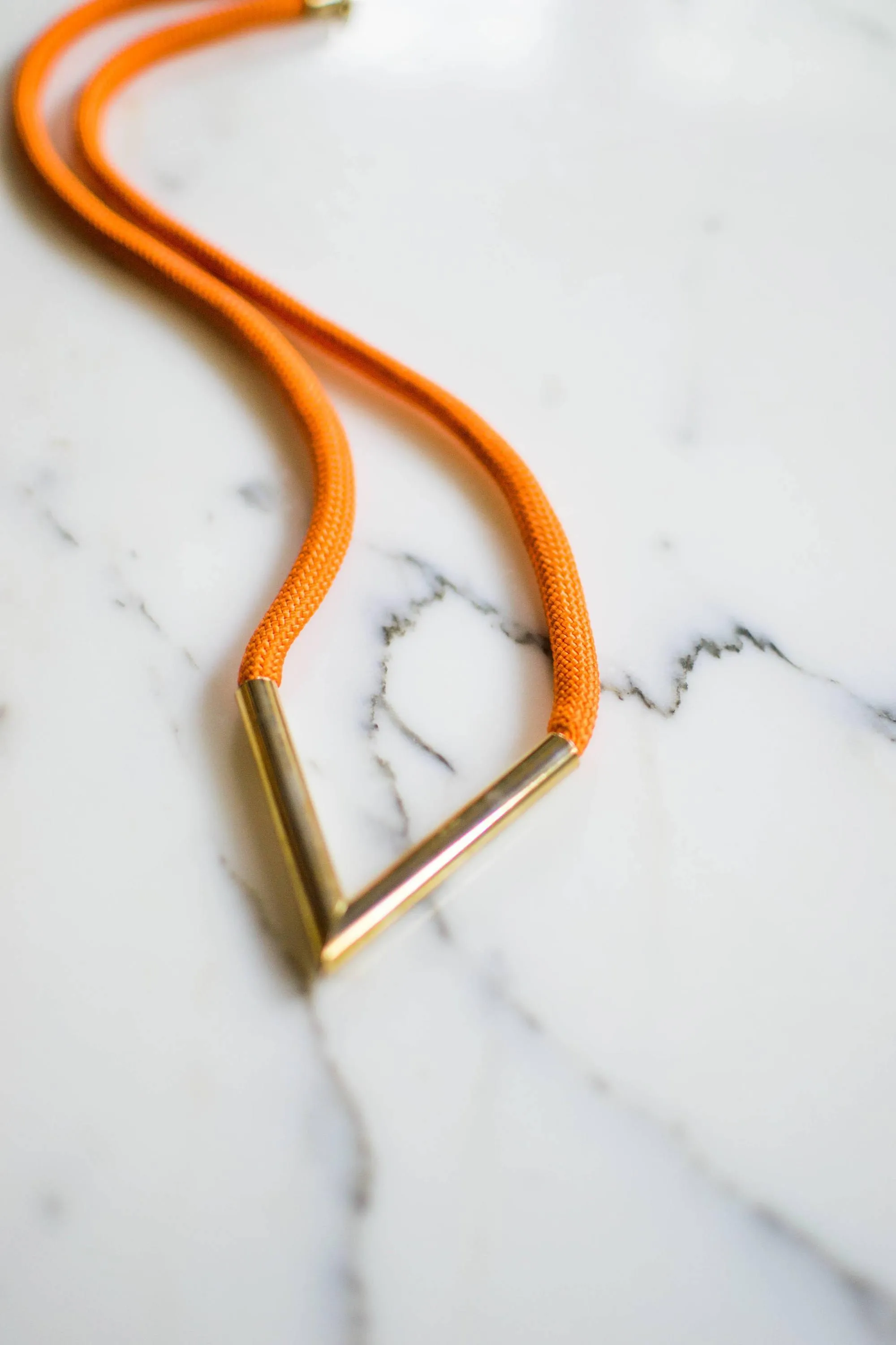 Diane von Furstenberg Orange Silk Cord Gold Triangle Necklace