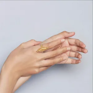 Roma Narsinghani Neelam Ring Ring The piece is set in brass, hand enameled with 18KT gold finesse. Each piece is unique and handcrafted by our artisans. RNLOVE05
