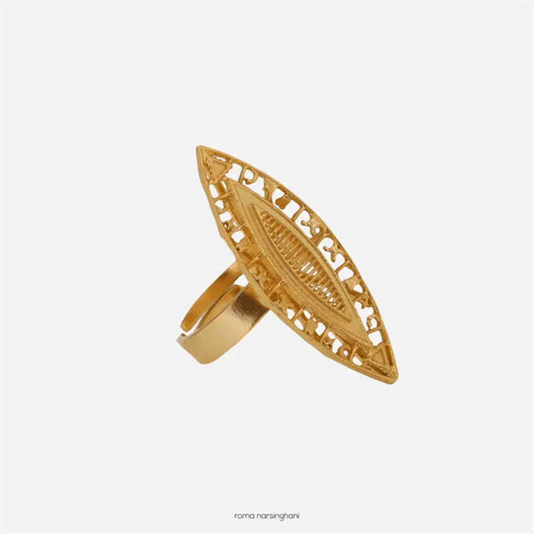Roma Narsinghani Neelam Ring Ring The piece is set in brass, hand enameled with 18KT gold finesse. Each piece is unique and handcrafted by our artisans. RNLOVE05