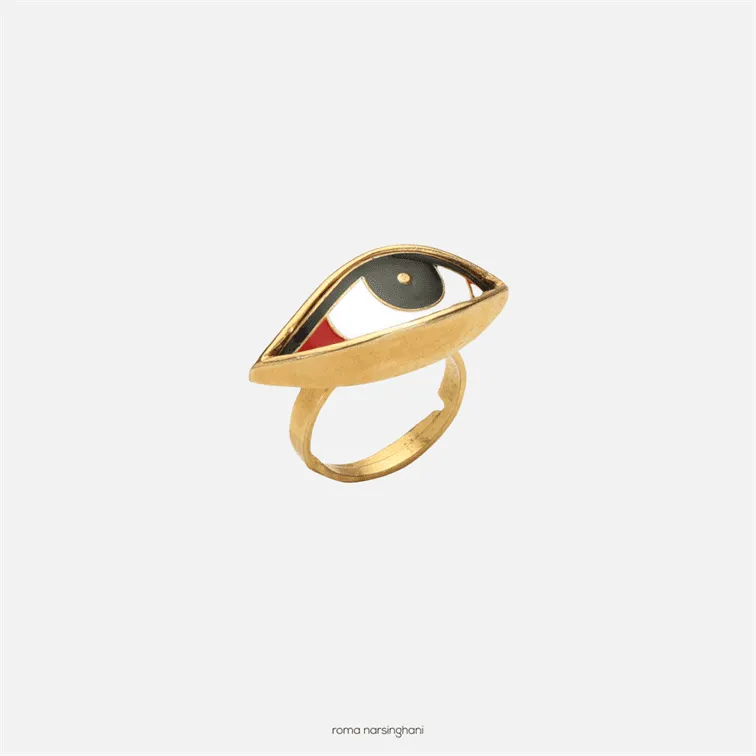 Roma Narsinghani Third eye ring Ring The piece is set in brass, hand enameled with 18KT gold finesse. Each piece is unique and handcrafted by our artisans. RNLOVE09
