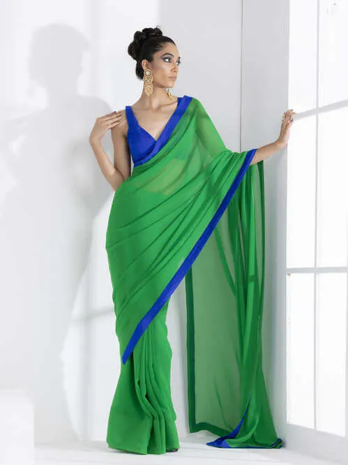 Tree Green Georgette Saree with Blue Posh Fabric Border & Blouse Fabric