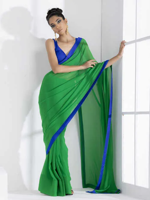 Tree Green Georgette Saree with Blue Posh Fabric Border & Blouse Fabric